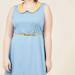 Sky blue dress with yellow collar and yellow belt